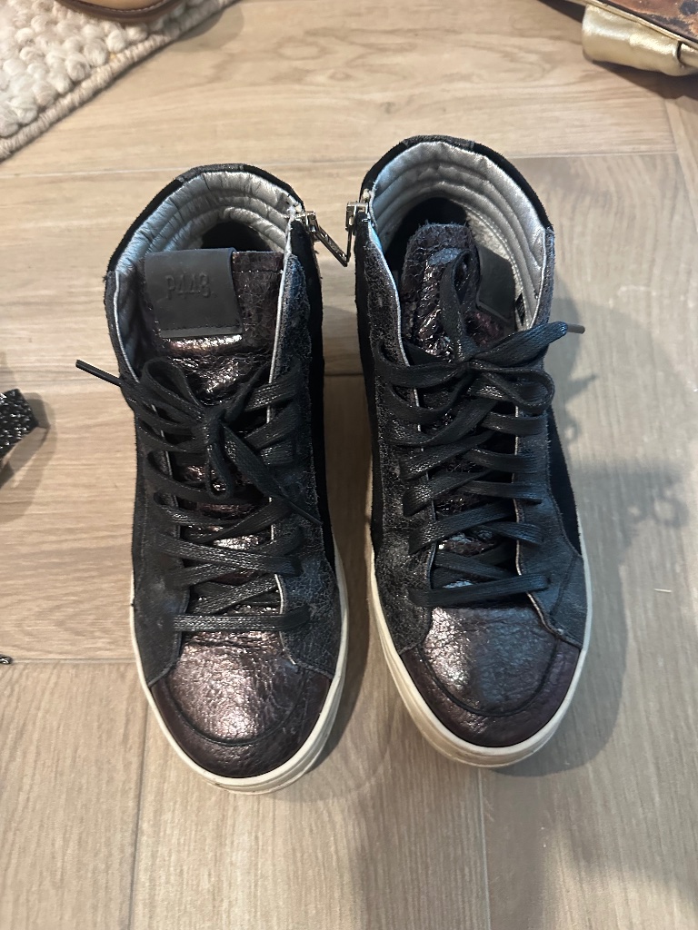 P448 38 Worn Once. Black High Top